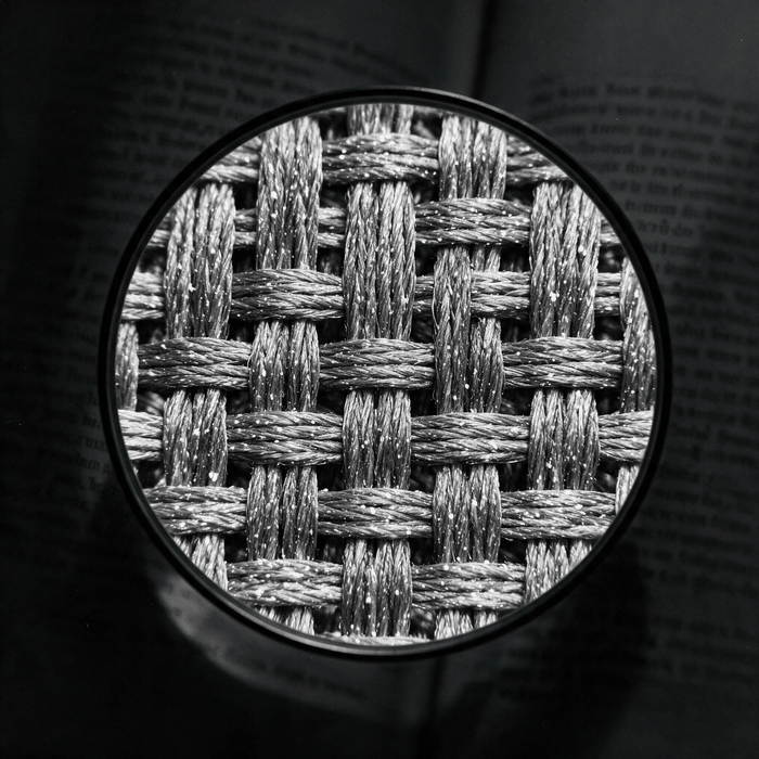 Microscope view of activewear fabric fibers — looking closer at what the supply chain is actually made of